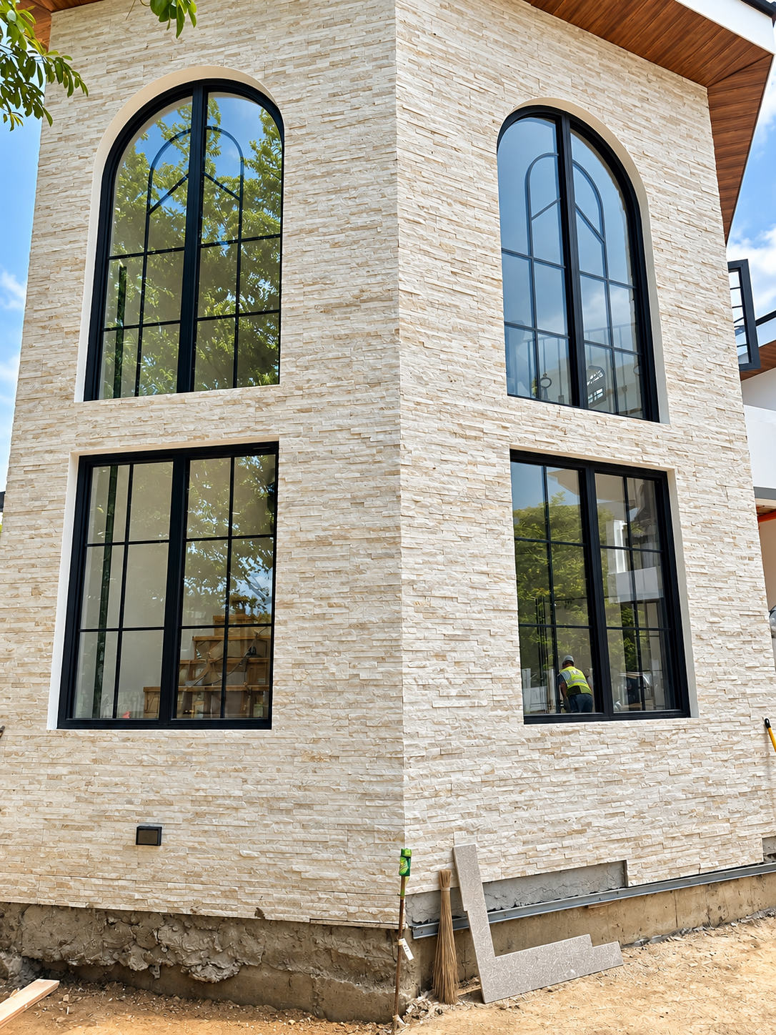 Black aluminum and glass window systems installed by OTEC